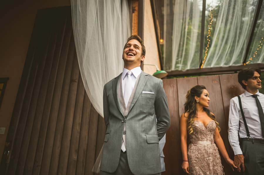 groom smiling during ceremony